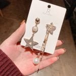 Odd pair Star earring