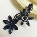 Star flower hairclip with blue stone