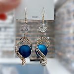 Pearl In Big Spiral Earring