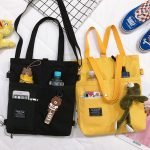 Multipocket canvas shoulder bag with umbrella pocket and water bottle pocket