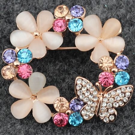 Gerland flower brooch with multicolor stone