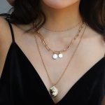 Multilayer necklace with queen pendant