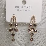 Oubi Yabi triple rhinestone tassel earring