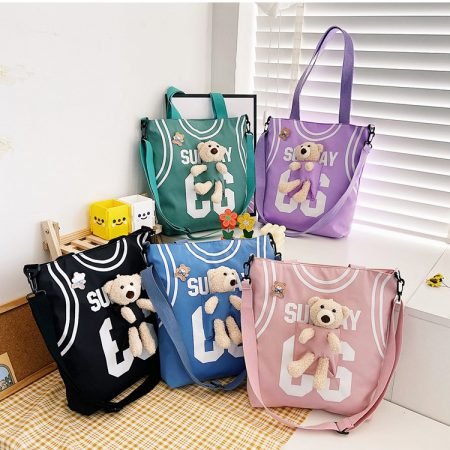 Nylon Jercey style bag with bear doll