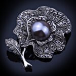 Antique wild rose brooches with pearl