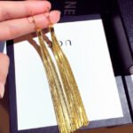 Cone bond long tassel earring