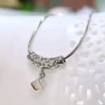 Red apple oval pipe andpendant necklace