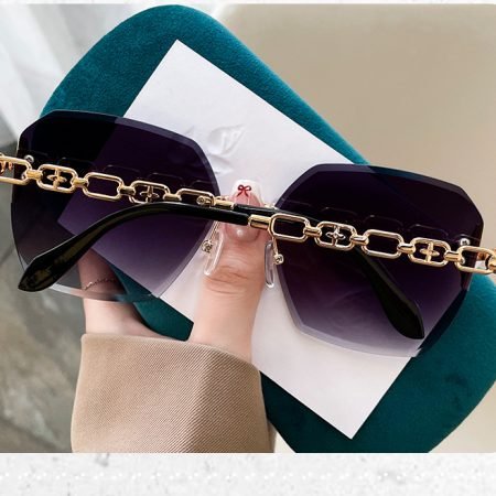 Ornamental leg frameless sunglasses