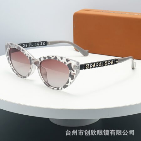 Die cut leg cats eye shaped sunglass