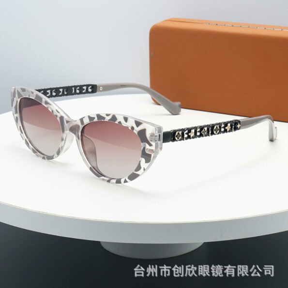 Die cut leg cats eye shaped sunglass
