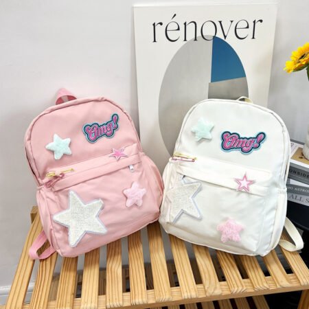 Fashionable backpack with star and text decoration