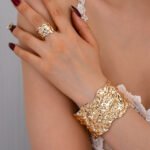 Shiny golden abstract baracelet ring set