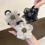 High value mesh rhinestone flower hair clip